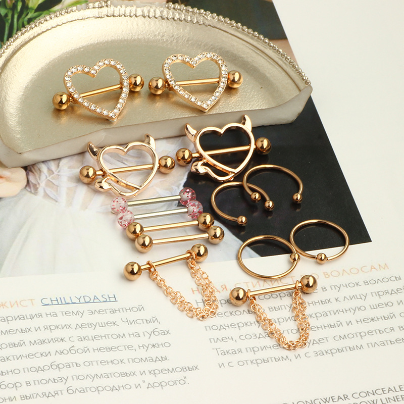 Amazon's Best-Selling New 7-Pair Breast Ring Set - Rose Gold Stainless Steel Body Piercing Jewelry - Image 4